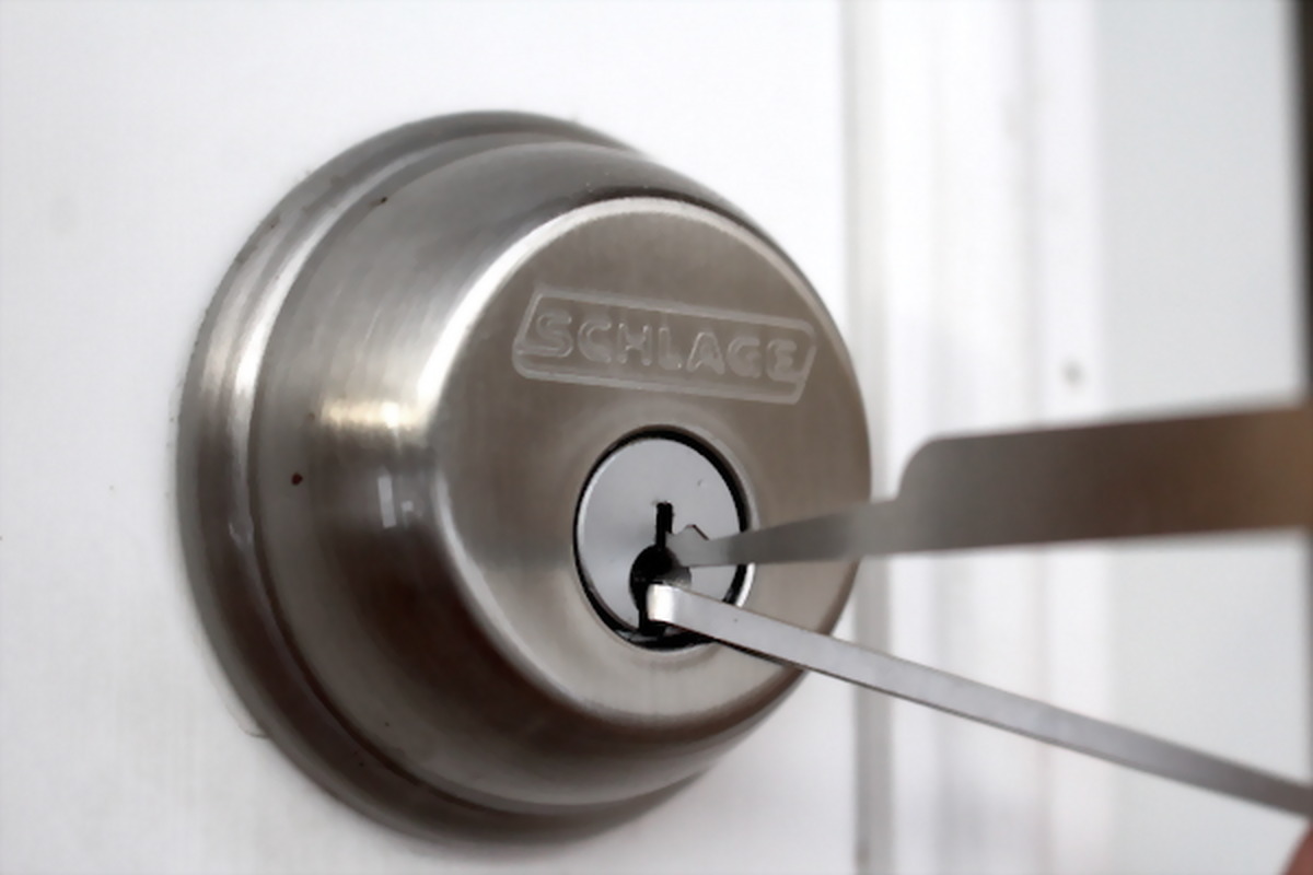 Residential Schlage deadbolt being opened without damage, pick and tension wrench in the keyway, by A Phoenix Locksmith, Phoenix